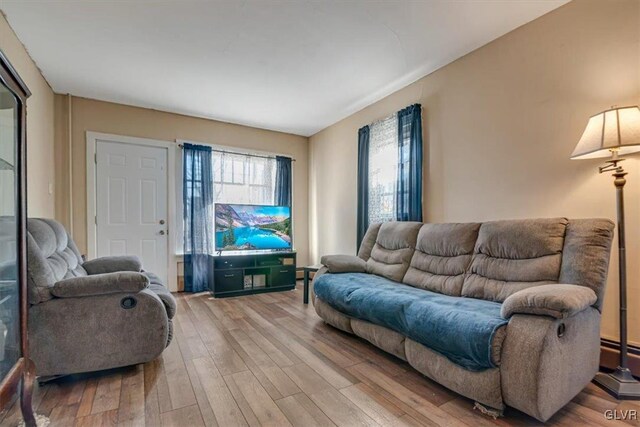 living area with wood finished floors