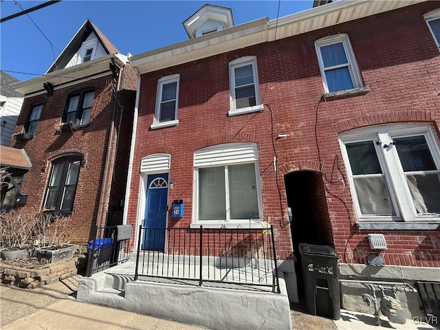 multi unit property featuring brick siding