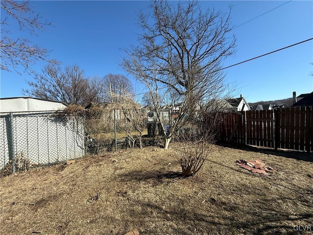 view of yard featuring fence