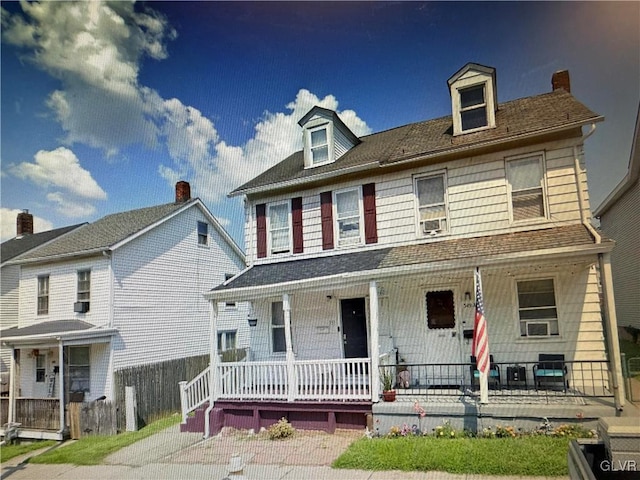 view of front of home featuring covered porch