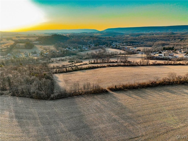 mountain view featuring a rural view