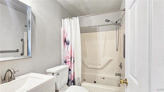 bathroom with vanity, toilet, and shower / bath combo with shower curtain