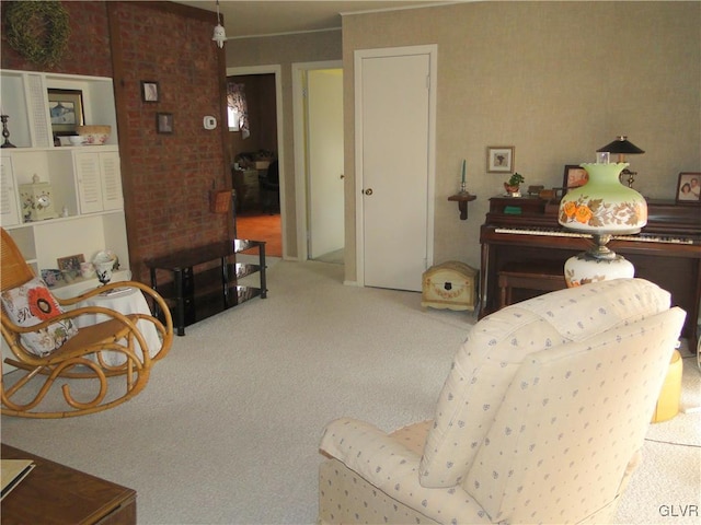 living area with carpet flooring