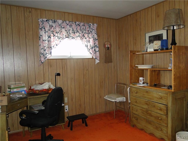 home office with wood walls and carpet flooring