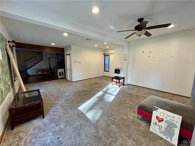 carpeted living room with recessed lighting, stairway, baseboards, and a ceiling fan