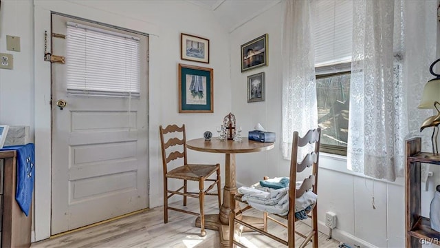 dining space featuring wood finished floors