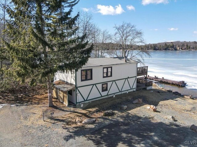 view of outdoor structure with a water view