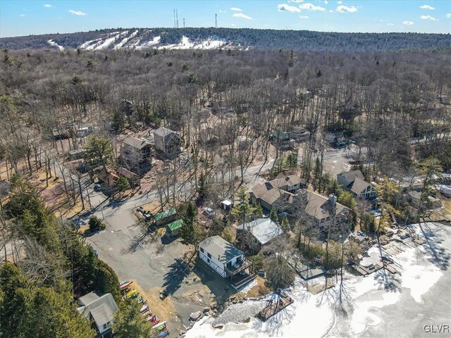 aerial view featuring a view of trees