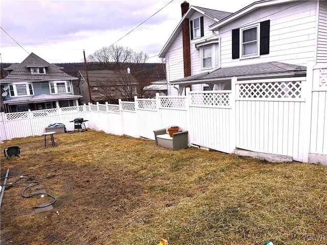 view of yard featuring fence