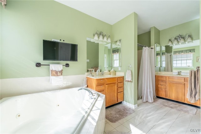 full bath featuring a tub with jets, vanity, a shower stall, and tile patterned flooring