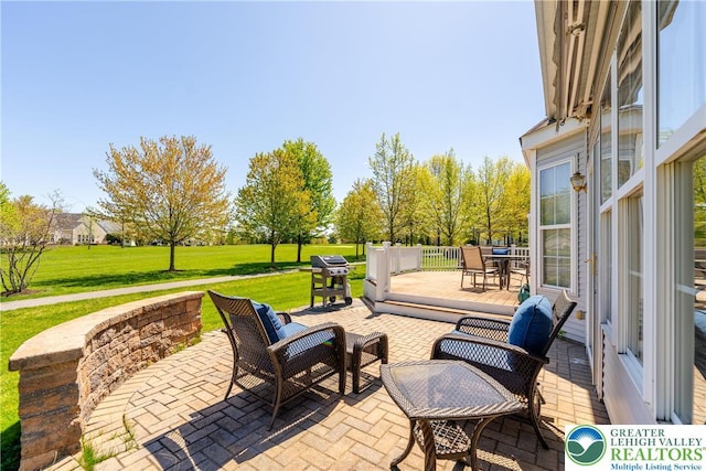 view of patio / terrace with area for grilling and outdoor dining space