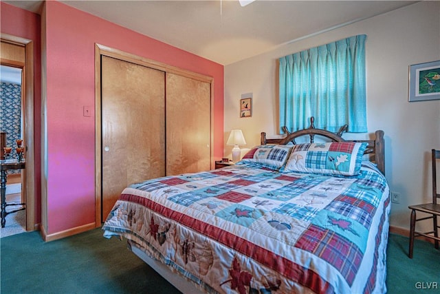 bedroom featuring a closet, carpet floors, and baseboards