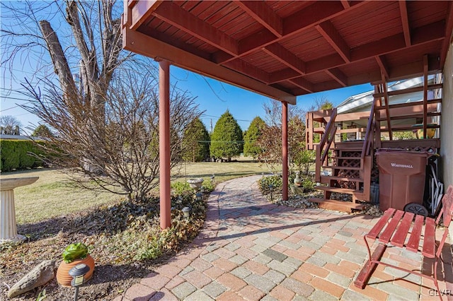 view of patio featuring stairs