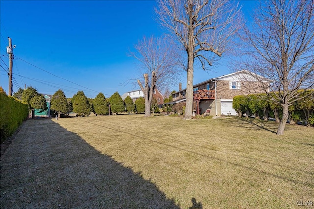 view of yard with an attached garage