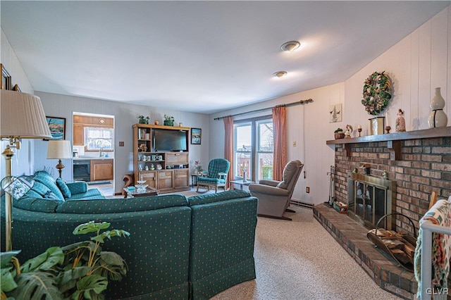 living area with carpet, a brick fireplace, and beverage cooler