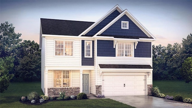 view of front of house featuring stone siding, a lawn, driveway, and an attached garage