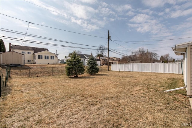 view of yard with fence