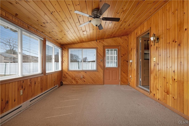 unfurnished sunroom with baseboard heating, wooden ceiling, and a ceiling fan