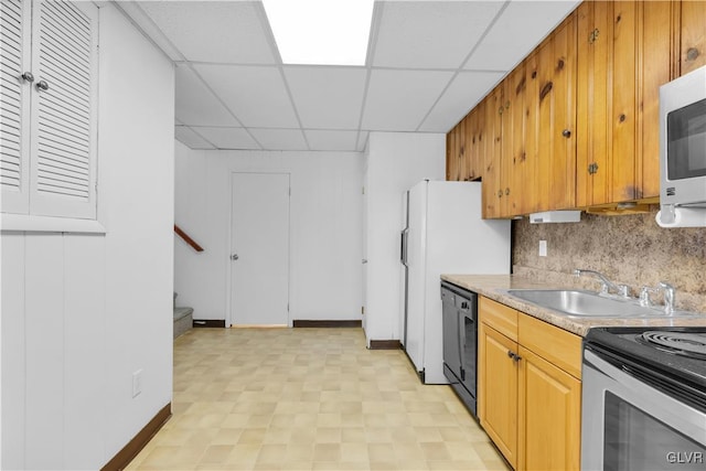 kitchen with white microwave, stainless steel electric stove, light countertops, dishwasher, and tasteful backsplash