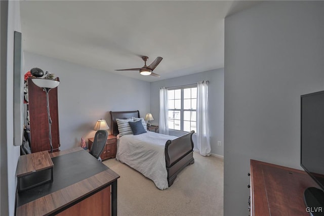 bedroom with baseboards, light colored carpet, and ceiling fan