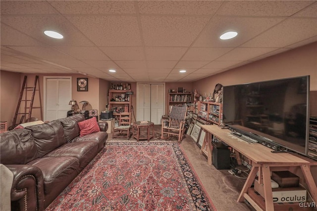 living area with recessed lighting and carpet floors