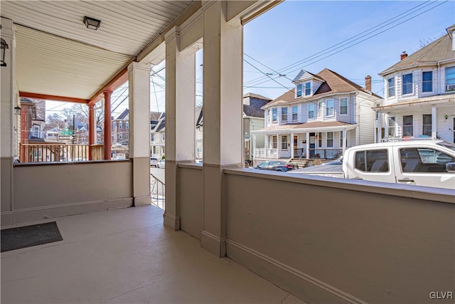 balcony featuring a residential view