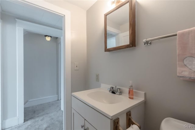 half bath with toilet and vanity