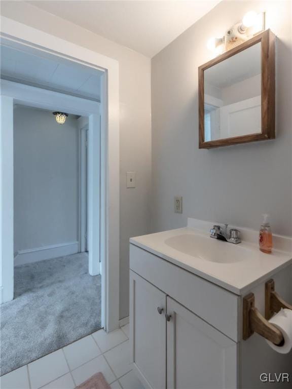 bathroom with vanity and tile patterned flooring