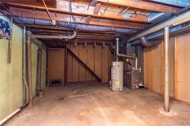 unfinished below grade area with gas water heater and heating unit