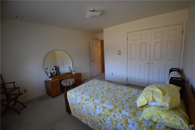 carpeted bedroom with a closet