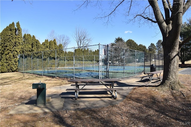 view of sport court with fence