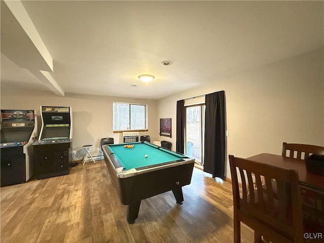 recreation room featuring pool table, baseboards, and wood finished floors