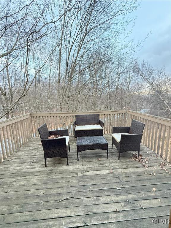 248 Penn Forest Trl, Penn Forest Township, PA 18210 - wooden deck featuring an outdoor living space