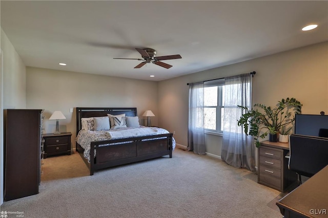 bedroom with recessed lighting, baseboards, light carpet, and ceiling fan