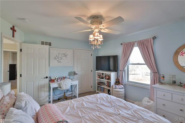 bedroom featuring visible vents and ceiling fan