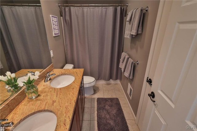 full bathroom featuring tile patterned floors, toilet, vanity, and a shower with curtain