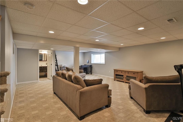 living area with light carpet, visible vents, recessed lighting, and baseboards