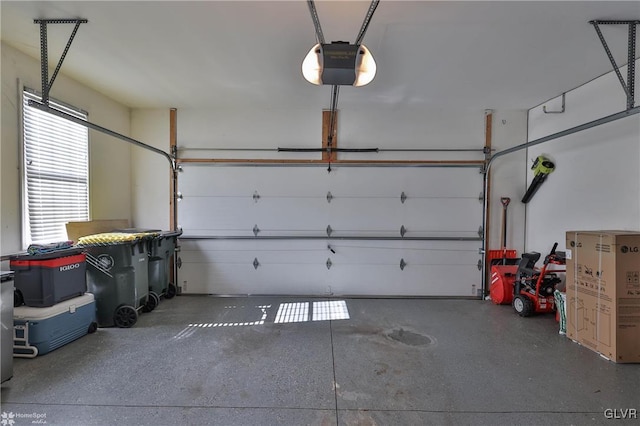 garage featuring a garage door opener