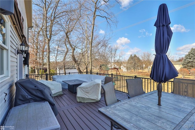 deck featuring outdoor dining space