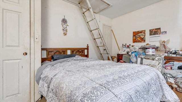 bedroom with attic access