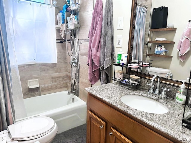 full bathroom featuring vanity, toilet, and shower / bath combo