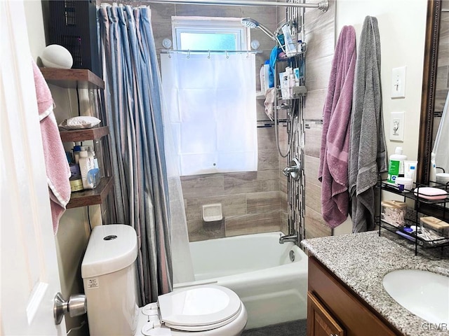 bathroom with vanity, toilet, and shower / tub combo with curtain