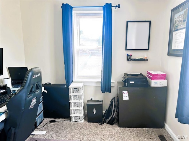 office space featuring visible vents and baseboards