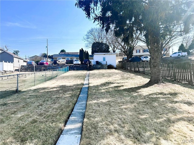 view of yard with fence