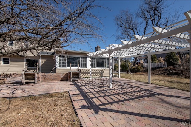 exterior space featuring a patio and a pergola