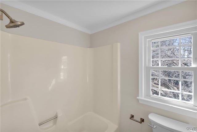 bathroom featuring ornamental molding, toilet, and walk in shower