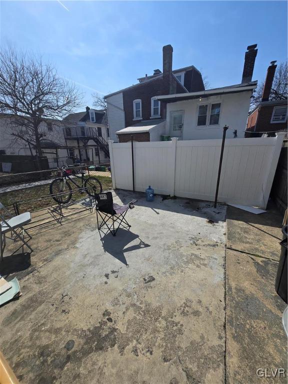 view of patio with fence