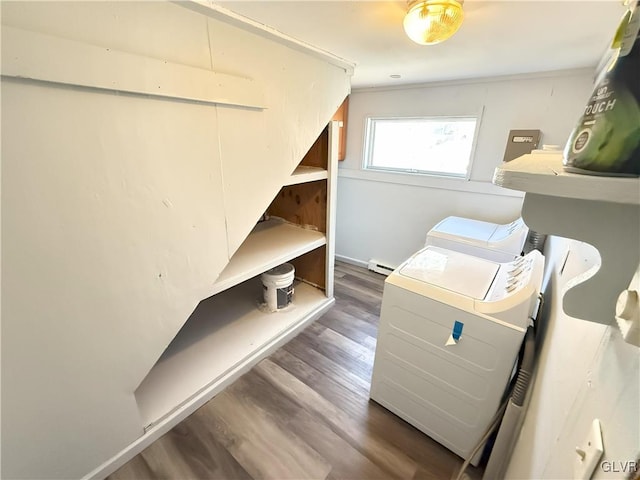 washroom featuring laundry area, independent washer and dryer, and wood finished floors