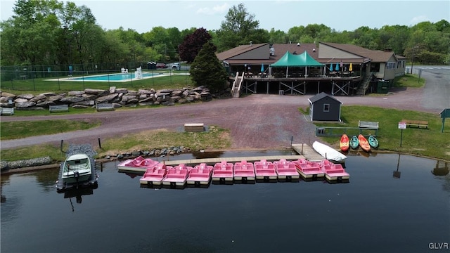 birds eye view of property with a water view