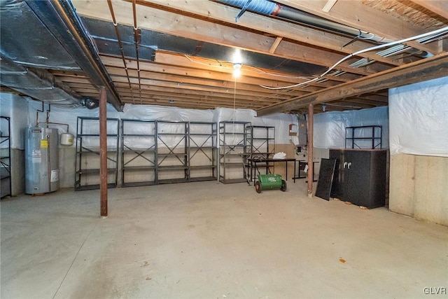 unfinished basement with electric water heater